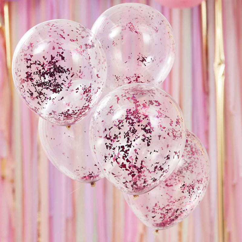 transparante ballonen met lilakleurige confetti snippers