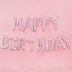 Lichtroze folie ballonnen met de tekst happy birthday