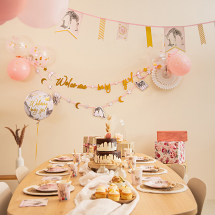 Roze en gouden versiering voor een babyshower meisje