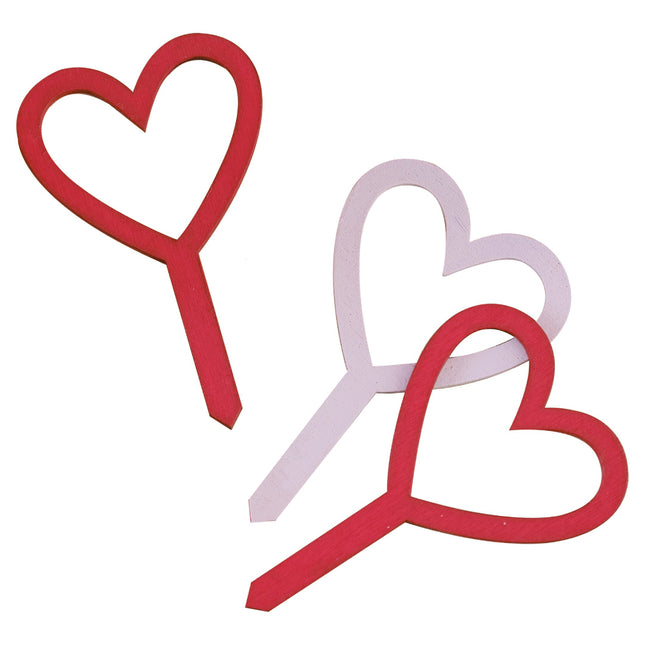 Roze en rode cupcake toppers in de vorm van hartjes