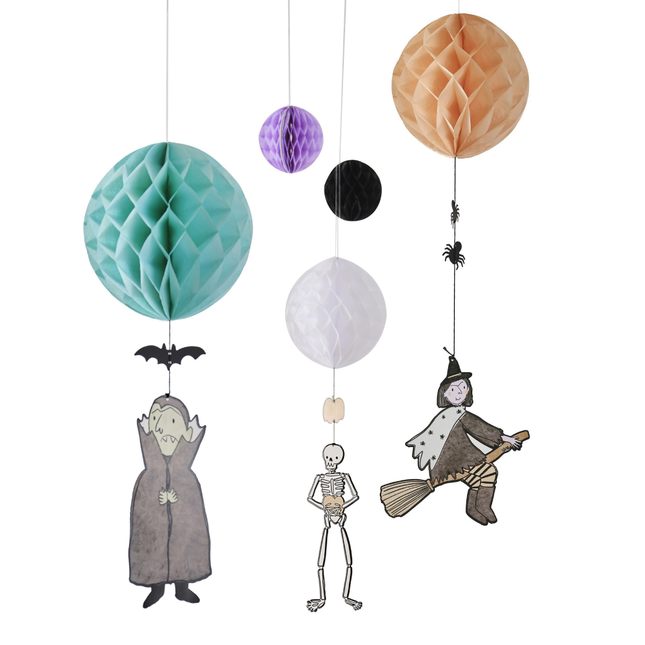 Honeycombs in het oranje, mint, paars, wit en zwart met versieringen eronder zoals een heks, vampier, vleermuis of spinnetjes