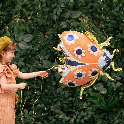 folieballon lieveheersbeestje met gouden poten en bloemen