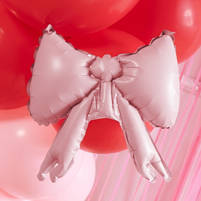 poederroze strik ballon