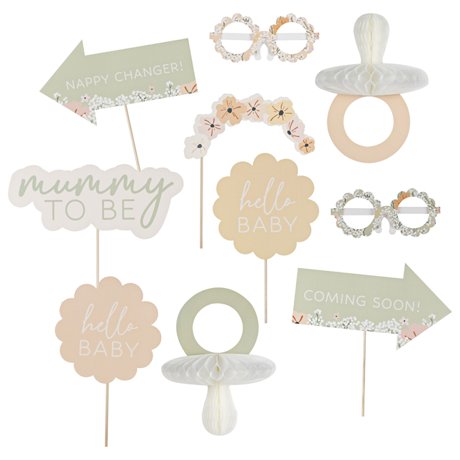 Photo booth props voor een babyshower in het saliegroen lichtroze en perzik