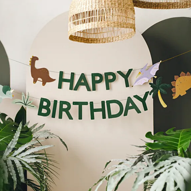 Groene slinger met de tekst happy birthday en dino's