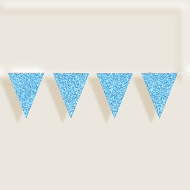 Vier blauwe vlaggetjes met glitters