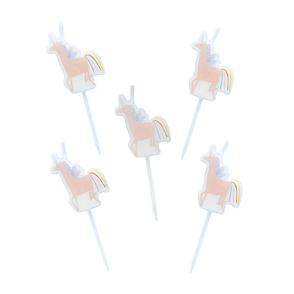 Eenhoorn kaarsjes in het lichtroze en paars met een regenboog staart