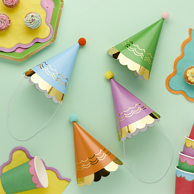 multicolor feesthoedjes met pom poms en gouden rand