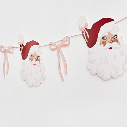 slinger met kerstmannen en roze strikjes
