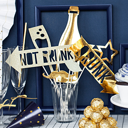 gouden en witte photo booth props