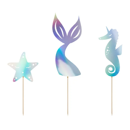 Caketoppers met iridescent effect in de vorm van een zeepaardje, zeester en zeemeerminstaart