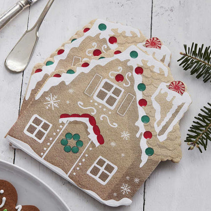 Stapel servetten in de vorm van een gingebreadhuisje