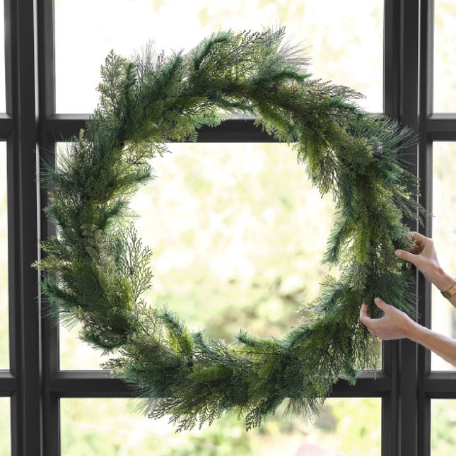 Kerstkrans voor een raam