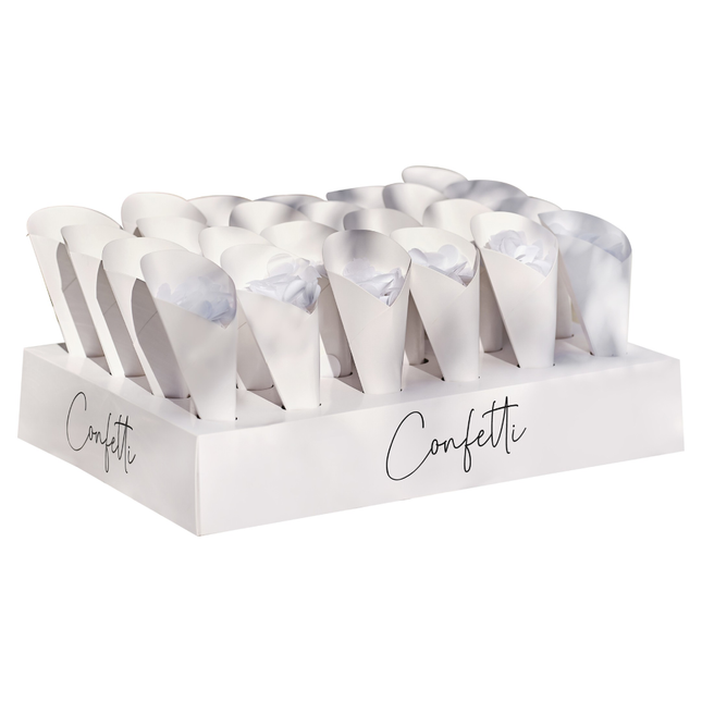 Witte standaard met zwarte tekst confetti en bakjes in de vorm van kegels gevuld met witte confetti