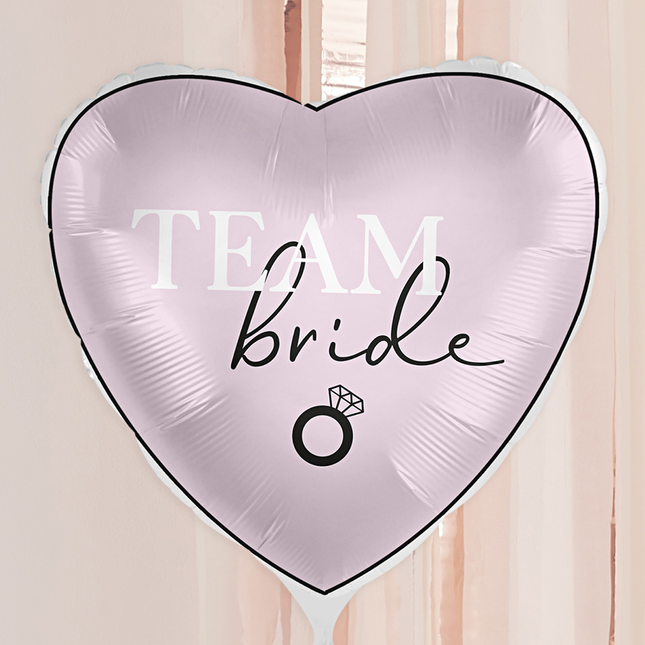 roze folieballon met de tekst team bride in het wit en zwart