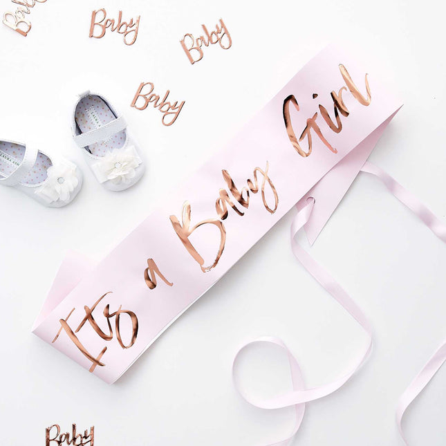 lichtblauwe sjerp met its a baby girl erop en kleine schoentjes