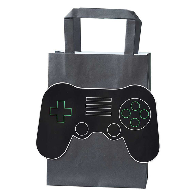 Zwart tasje met controller erop