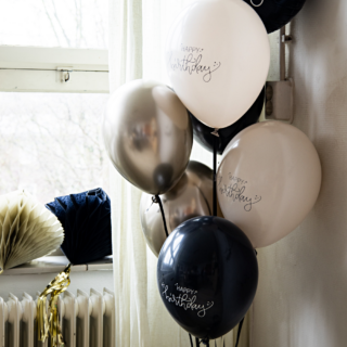 bundel zwarte, creme en metallic ballonnen